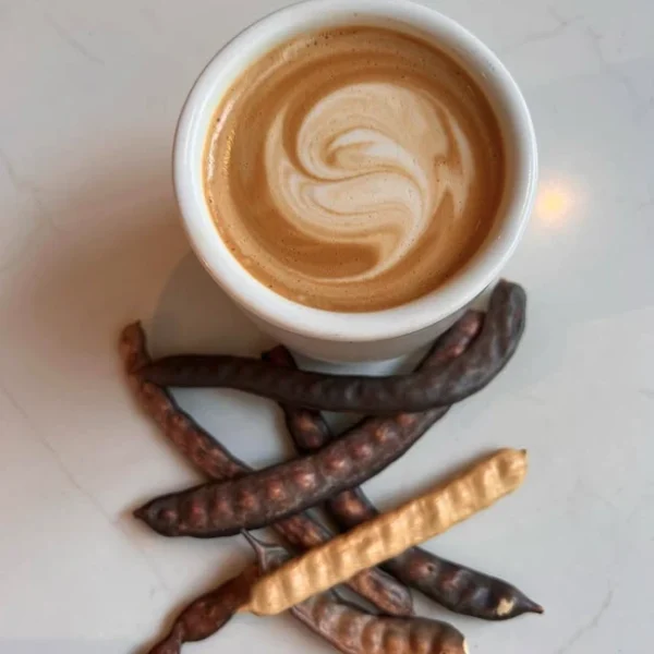 Organic Karoo mesquite dark-roasted into a rich, caffeine-free superfood coffee. Low acid, mineral-rich, brew in French press, moka or espresso. Crash-free energy.